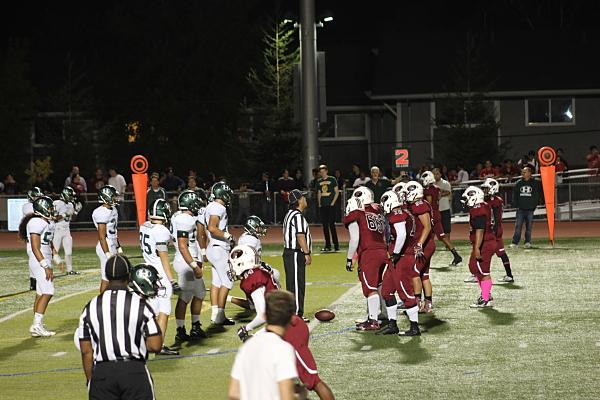 The Homestead and Fremont teams fight to receive the famous red and green bell.