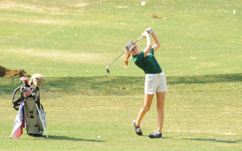 Junior Maddie Thorp takes a swing.