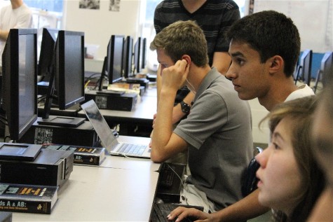 Programming Club members work on chat client workshop project