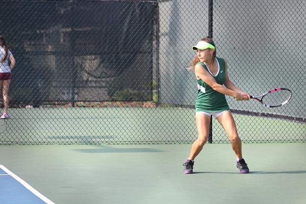 Freshman Zoe Clydesdale-Eberle makes a backhanded shot in the first round of CCS on Nov. 23.
