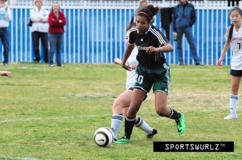 Yannah Melle playing for the Homestead Soccer team.