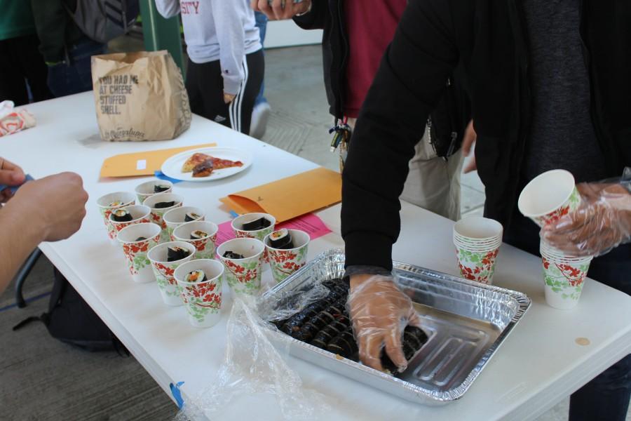 Korean Student Association distributes kimbap to be sold during Club N’ Grub

