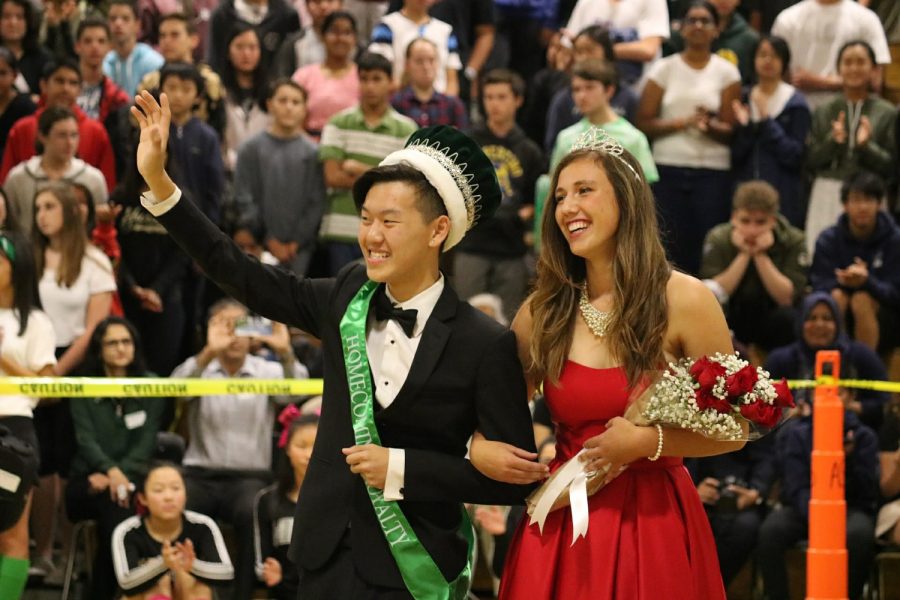 Seniors Simon Lee and Kristina Claras take in their win after being announced Homecoming King and Queen.