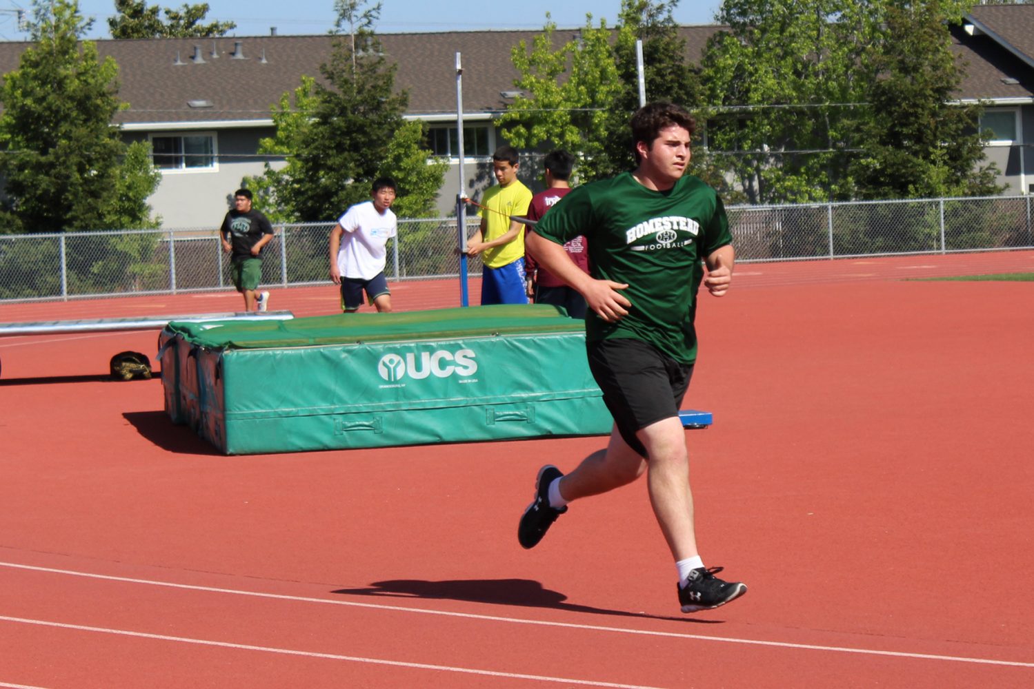 Players condition by running a mile during the practice.
