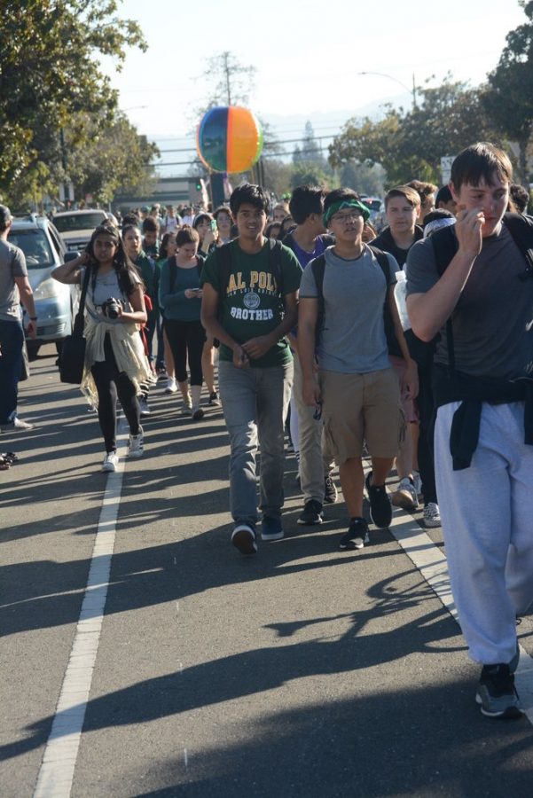 The sophomore class walks down Mary Avenue