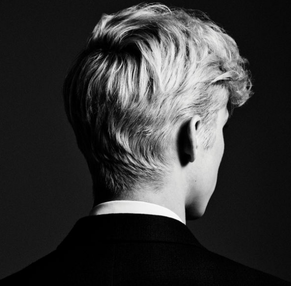 Troye Sivan hides lyrics relating to his personal growth throughout the album in connection to its name, “Bloom.” Photo courtesy of iTunes.