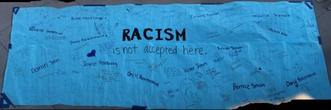 Poster filled with messages to send condolences to victims.