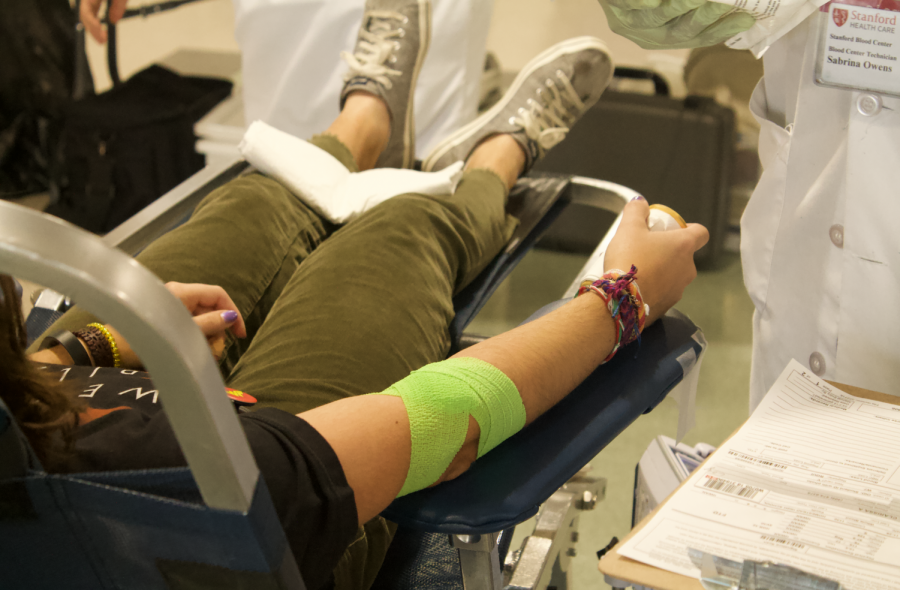 Senior Clarissa Tadros gets wrapped after her blood is drawn.