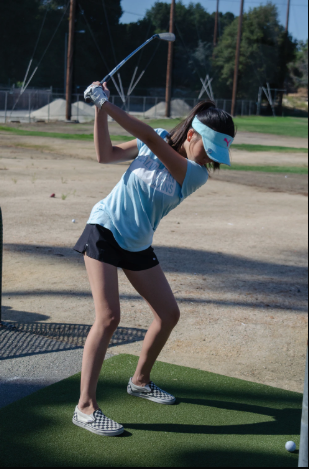 Freshman Linette Chang practices her swing.