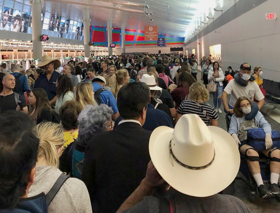 Intense Airport Screenings: Flights are delayed and airports fill up as passengers wait to be screened for COVID-19.