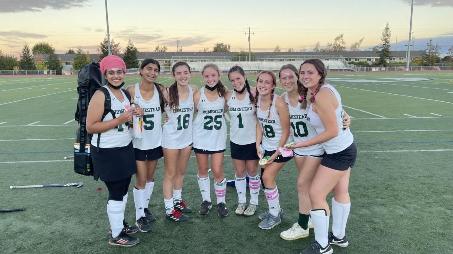 SENIORS LAST GAME: Varsity field hockey players smile after playing their last game at Homestead