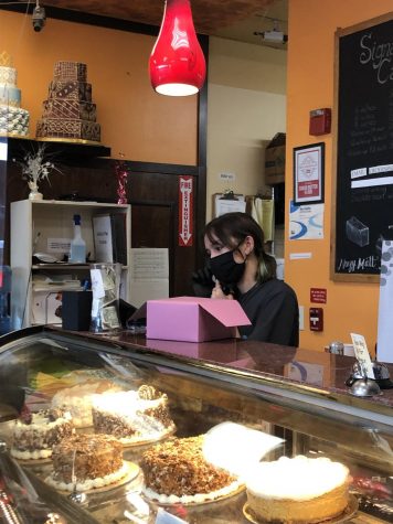  DEVELOPING NECESSARY SKILLS: Walch builds her communication skills by attending to an order over the phone, at the bakery she works at, Sugar Butter Flour.