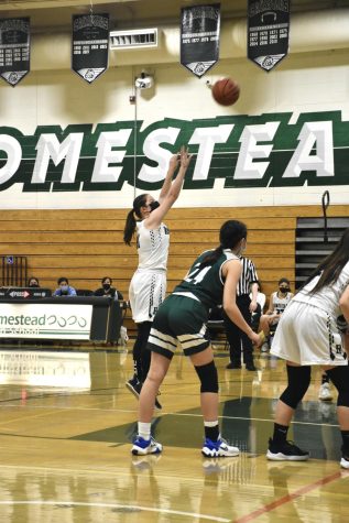 Sophomore Gabby Fourkas shoots a free throw during a game against Palo Alto high school.

