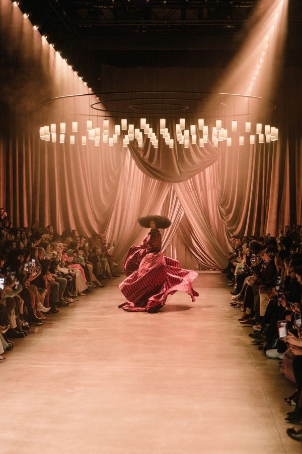 A GLAMOROUS FACADE: The grand sets of haute couture shows adds to the upscale image of luxury fashion.
