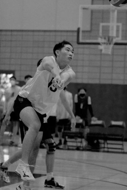 IMPROVING WHILE ADAPTING: As a new player on the varsity volleyball team, sophomore Siu said he adjusted to the new environment by giving his all on the court.