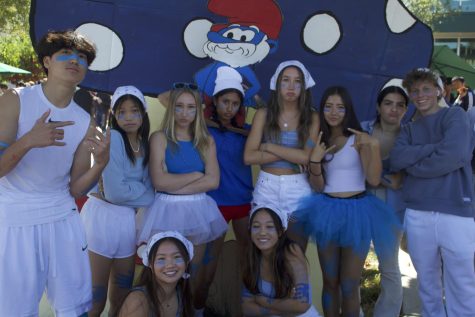 Sophomores dress in blue to reflect their “Smurfs” class theme. Additionally, seniors were assigned “Despicable Me,” juniors were assigned “Alvin and the Chipmunks,” and freshmen were assigned “Toy Story.”
