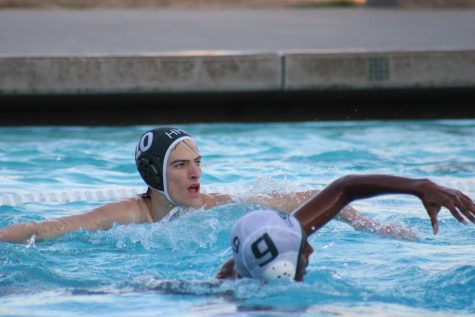 Despite injured athletes, the varsity boys water polo team has improved their scores and playing style, senior Alex Snook Manchon said. 
