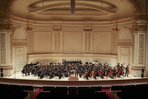 Due to hard work and consistent practice, HHS orchestra preserved the reputation of Carnegie Hall as one of the grandest concert halls in the world, junior Stephen Heller said. (Photo courtesy of John Burn)