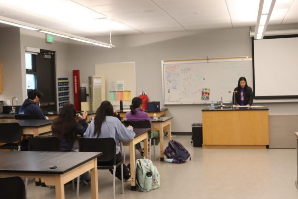 Students listen intently as Cuan presents a Bible passage. 