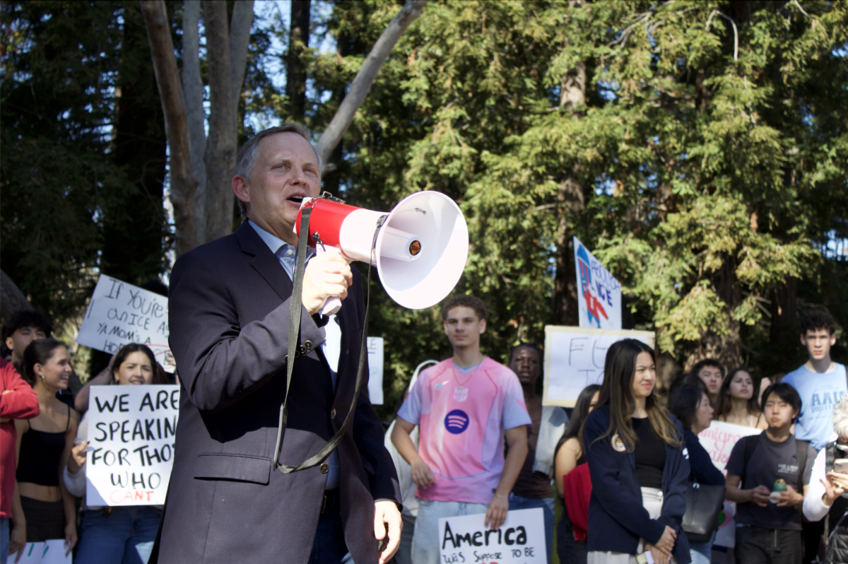 Following speeches by student leaders, mayor Klein takes the megaphone, providing words of encouragement for demonstrators. 
