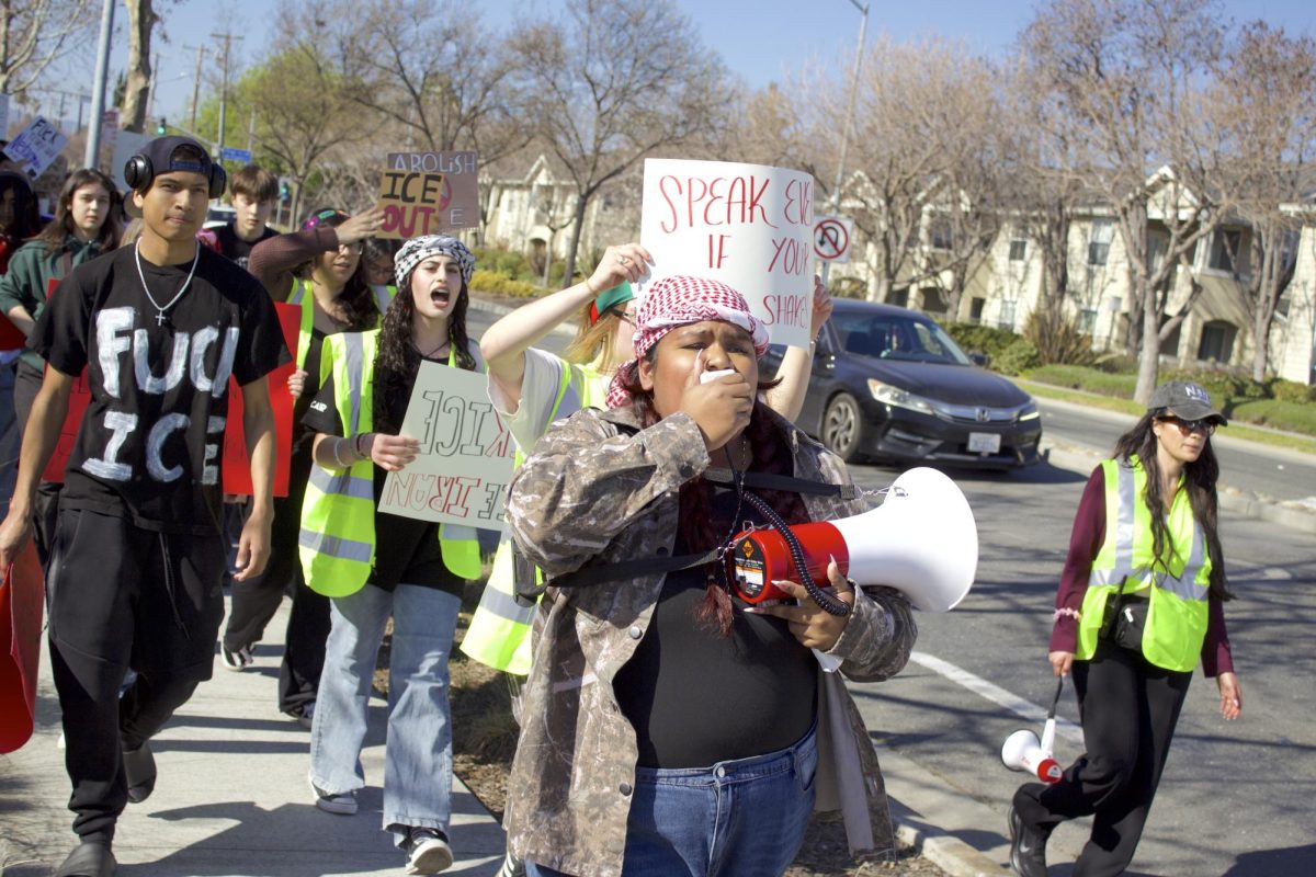 Students aimed to denounce the lack of protection for immigrant rights, recognizing that they live in a country built by these very immigrants, Syed (center) said. 